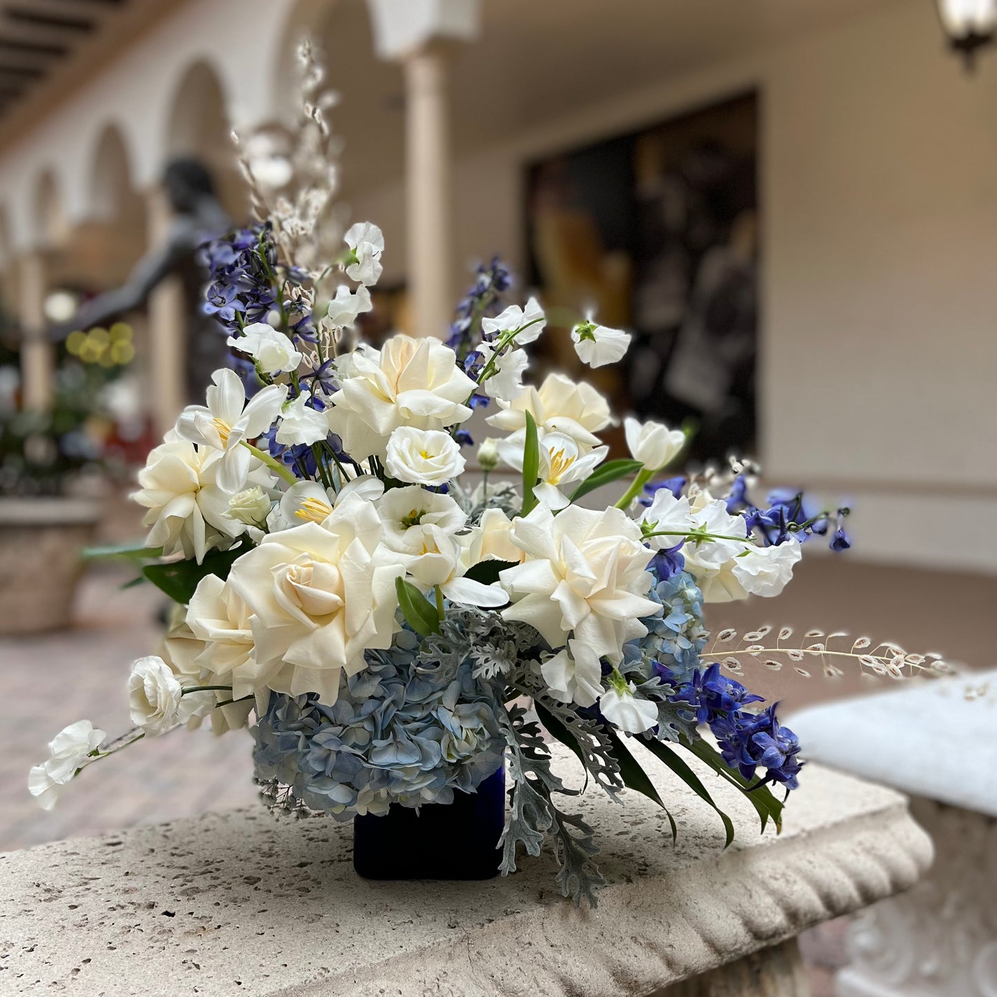 Blue and White Gift vase on a concrete bench