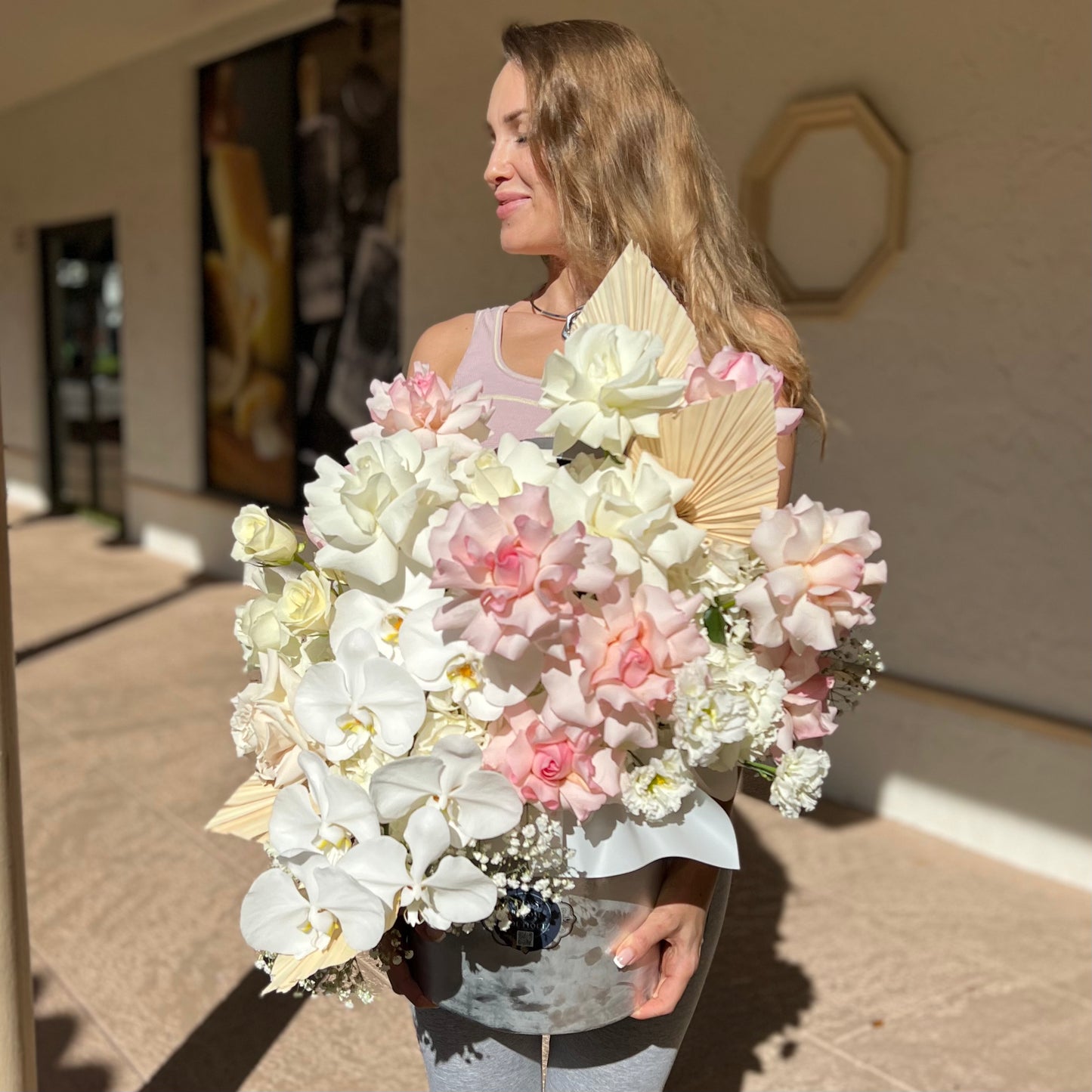 A beautiful woman with stunning flower box