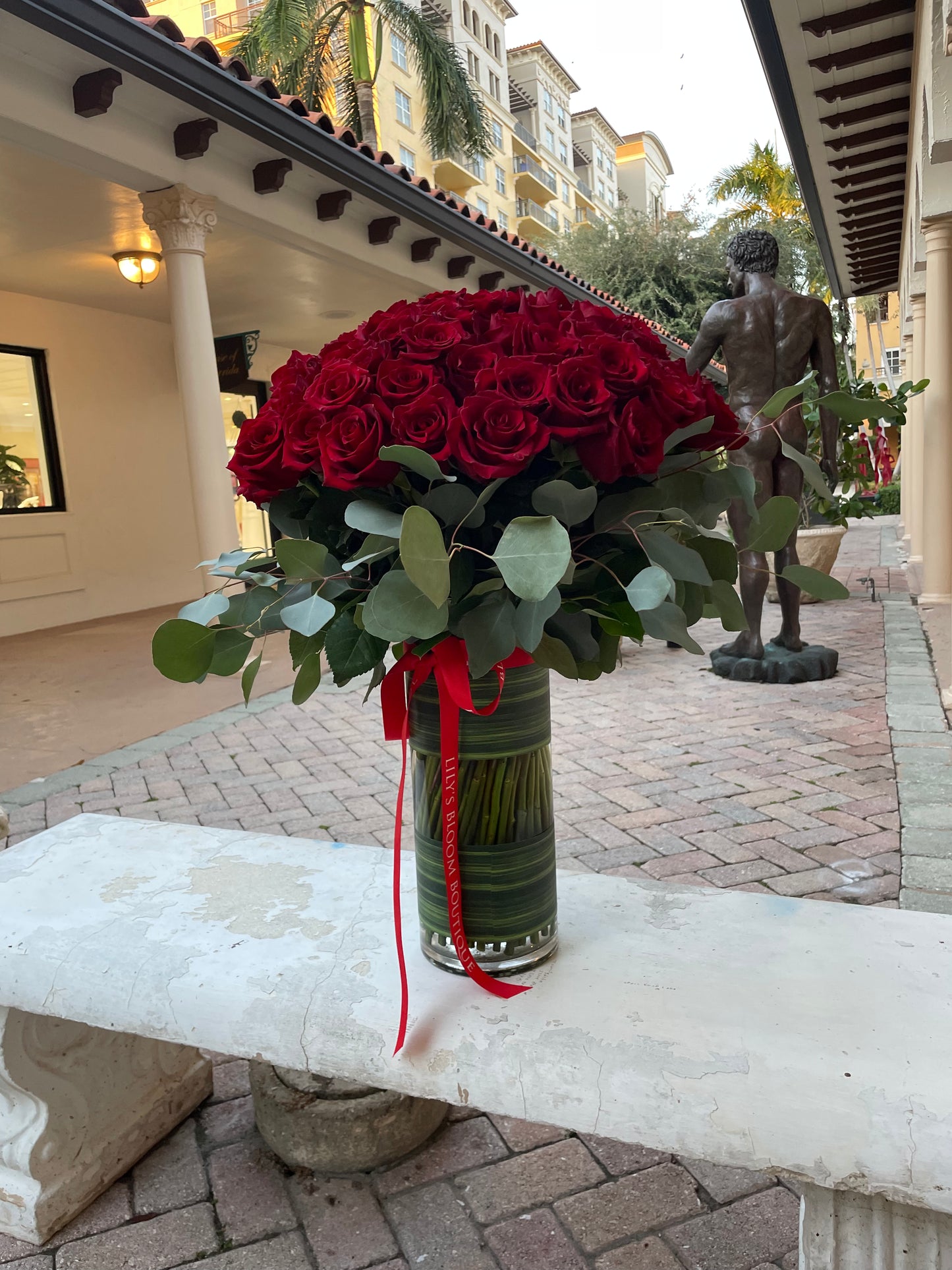 100 Premium Red Roses Monstera Vase