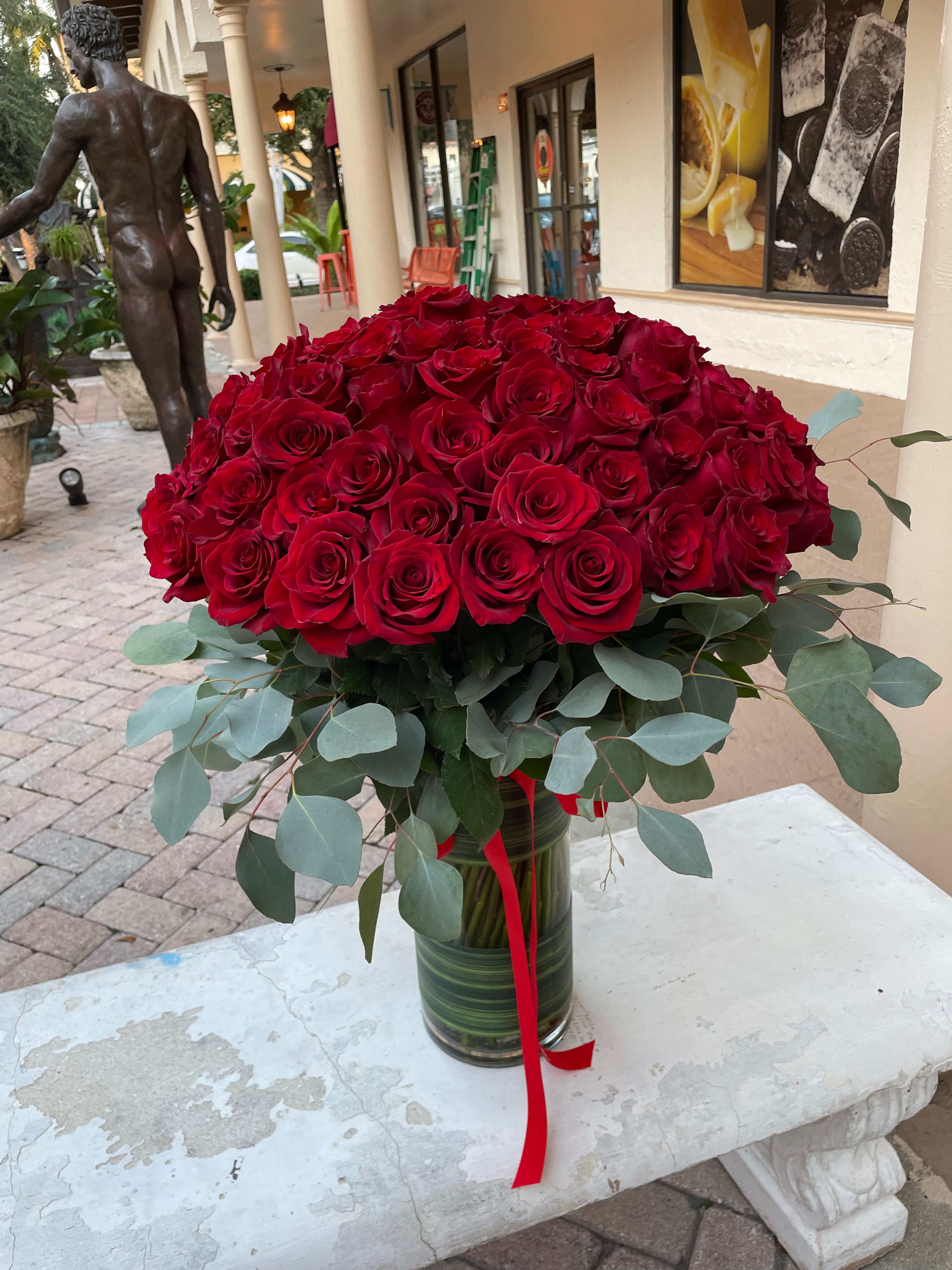 100 Premium Red Roses Monstera Vase