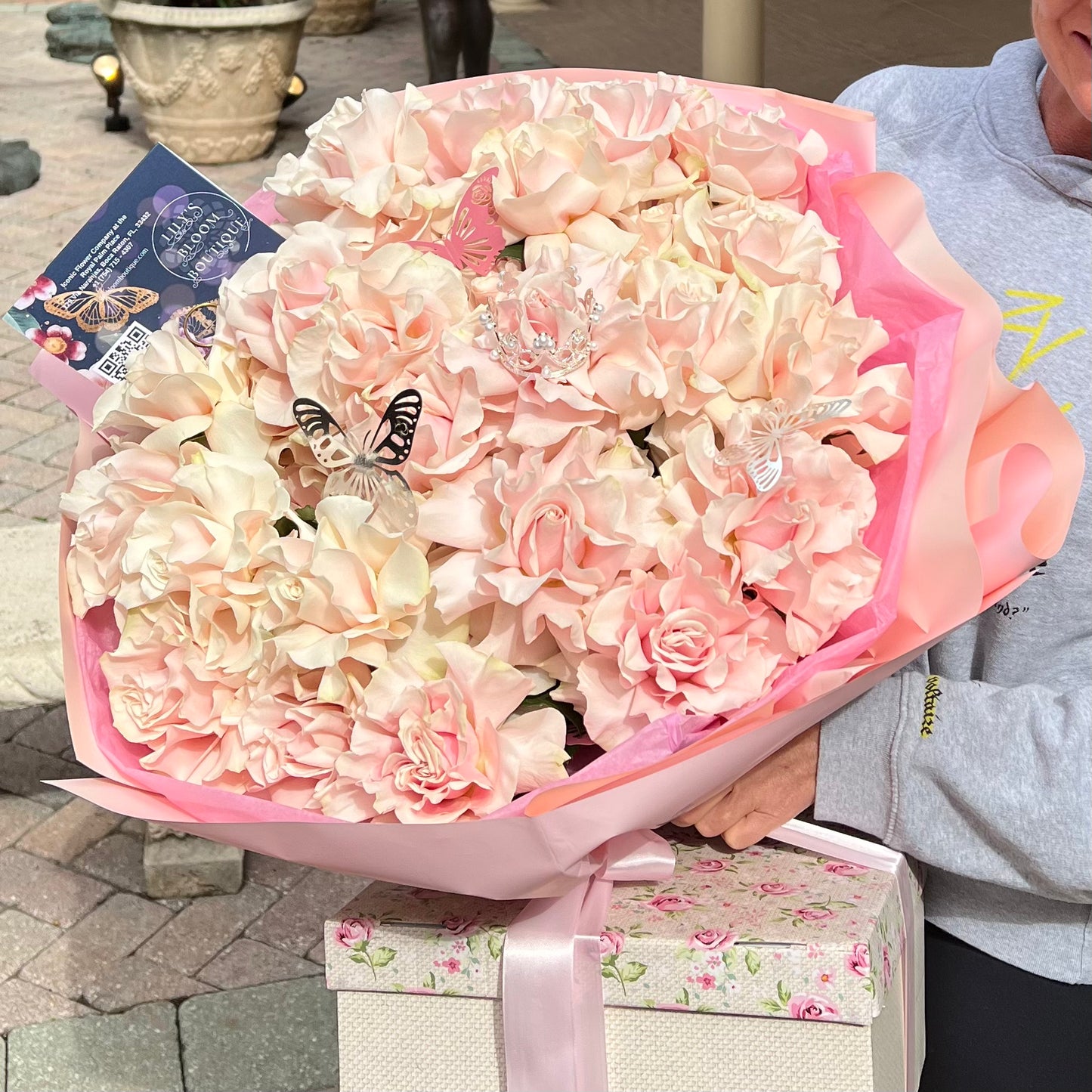 Pure Happiness Rose Bouquet with a crown and butterflies on top